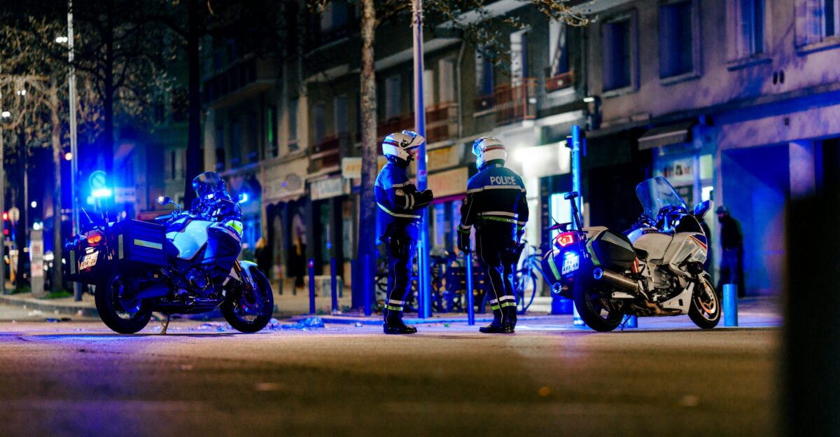 a group of motorcycles parked on the side of a road