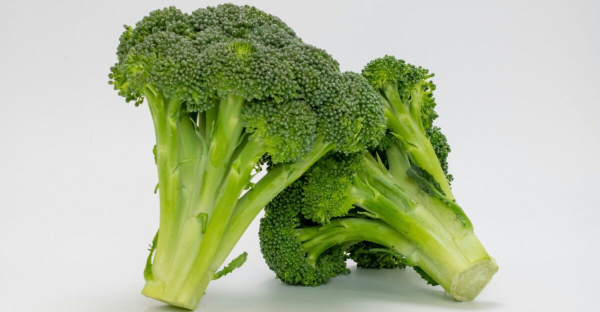 a close up of broccoli on a white background