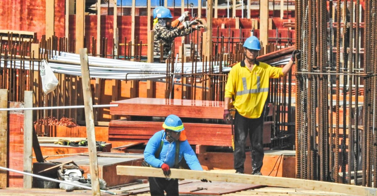 a group of men working on a construction site