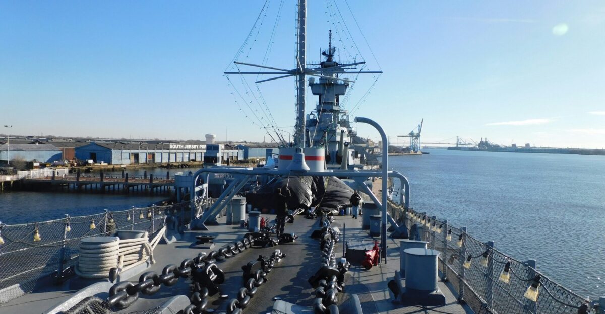 a large ship is docked in the water