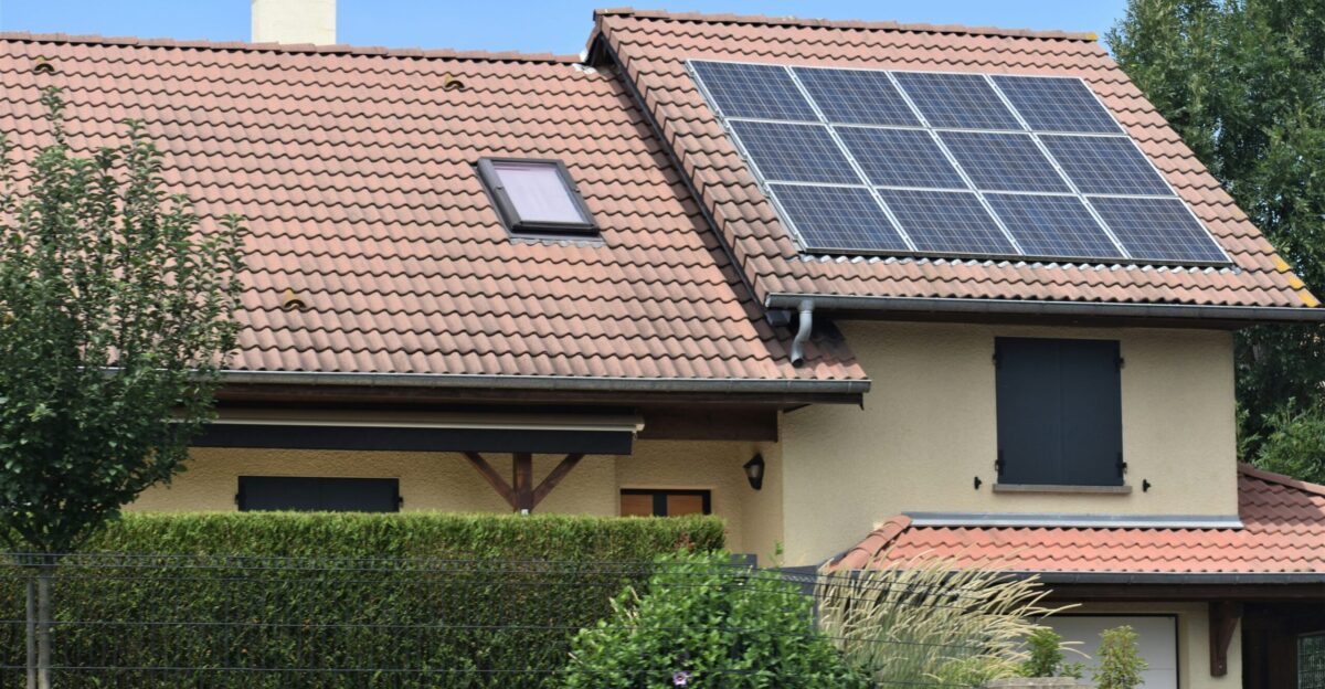a house with a solar panel on the roof