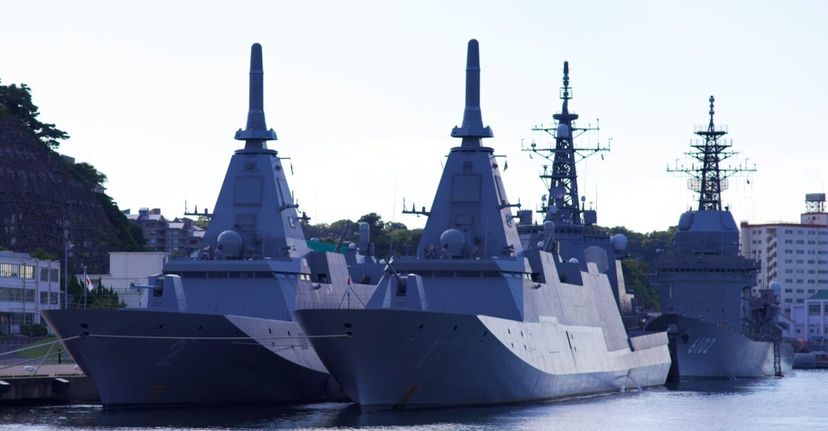 a couple of boats that are sitting in the water