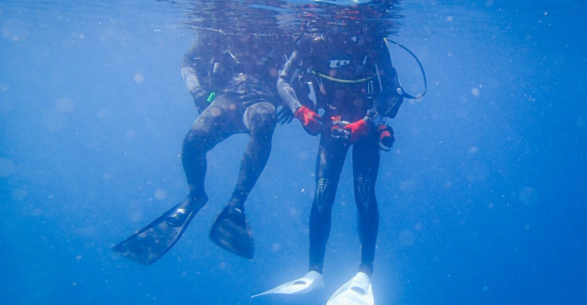 a couple of people that are in the water