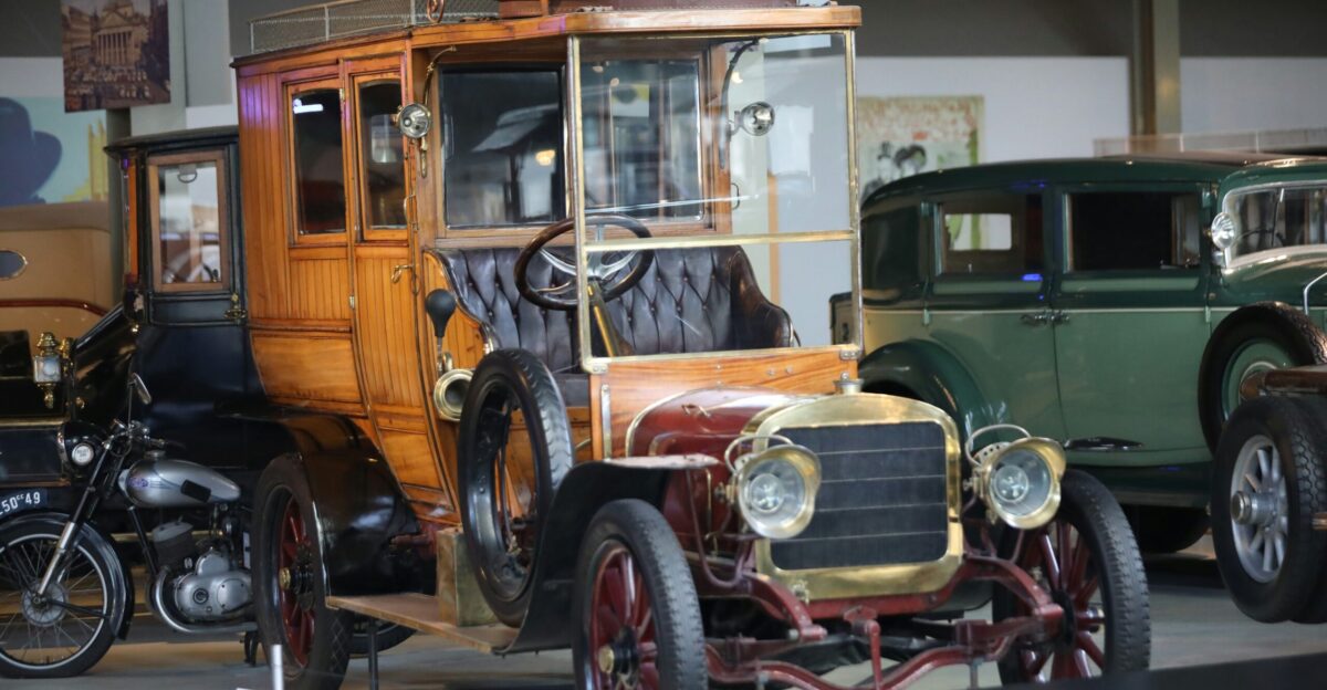 an antique car on display in a museum