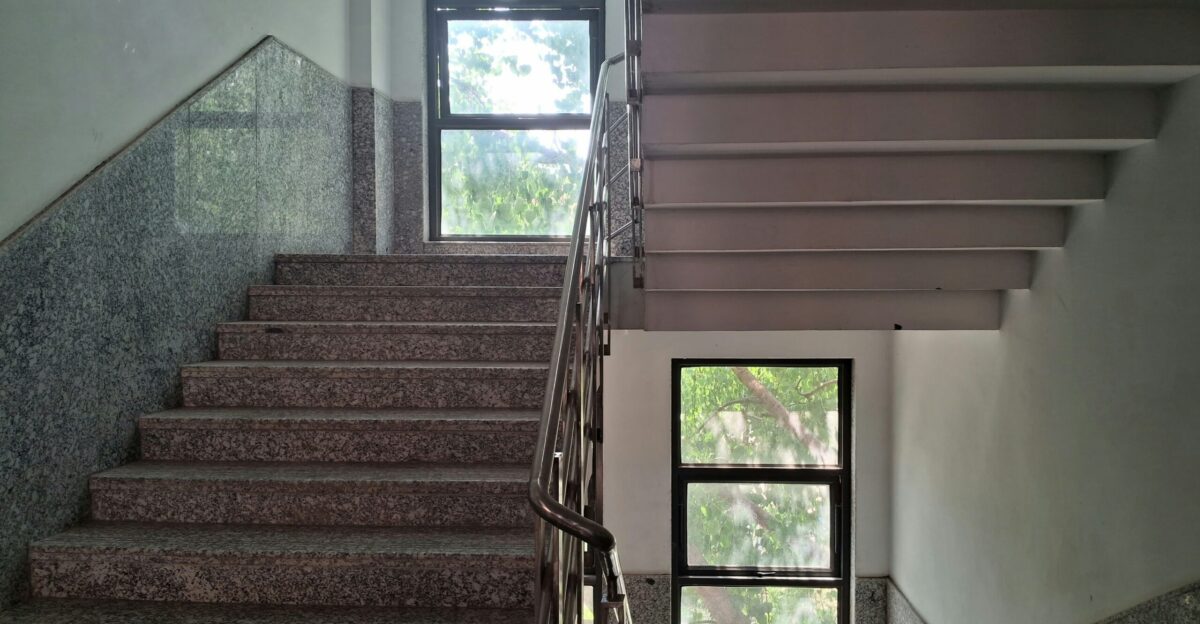 a set of stairs leading up to a window