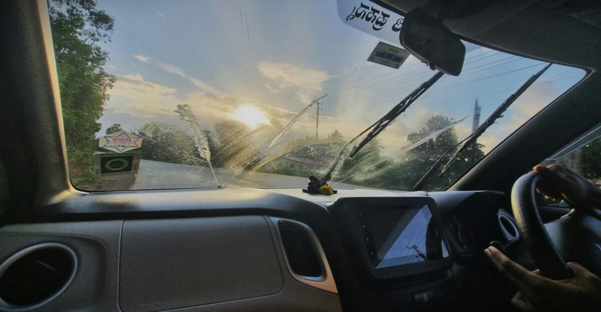 A view of the inside of a car from the driver s seat