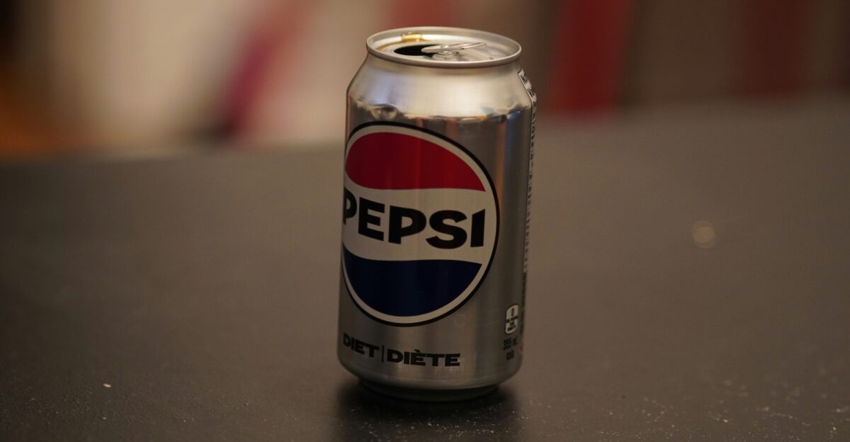 A can of pepsi sitting on top of a table