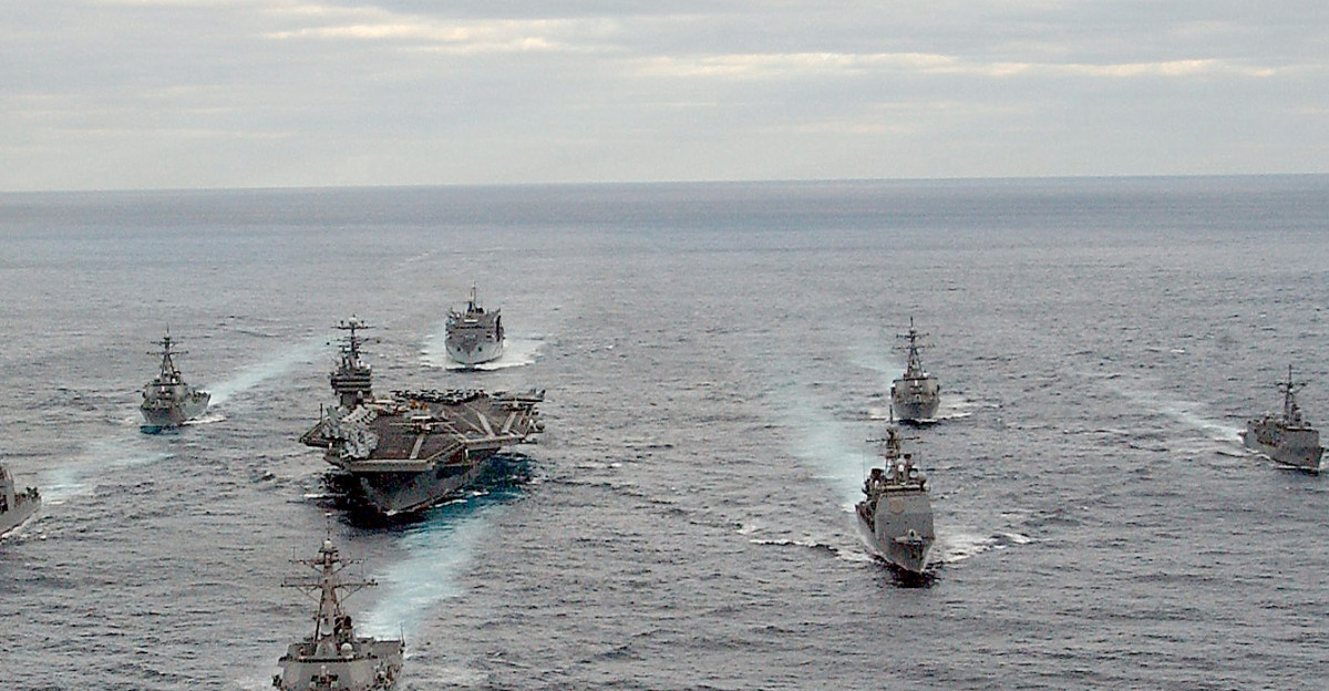 Atlantic Ocean Nov 30 2003 - USS George Washington CVN 73 Carrier Strike Group formation sails in the Atlantic Ocean Washington is conducting Composite Training Unit Exercise COMPTUEX in preparation for their upcoming deployment U S Navy photo by Photographer s Mate 2nd Class Summer M Anderson RELEASED
