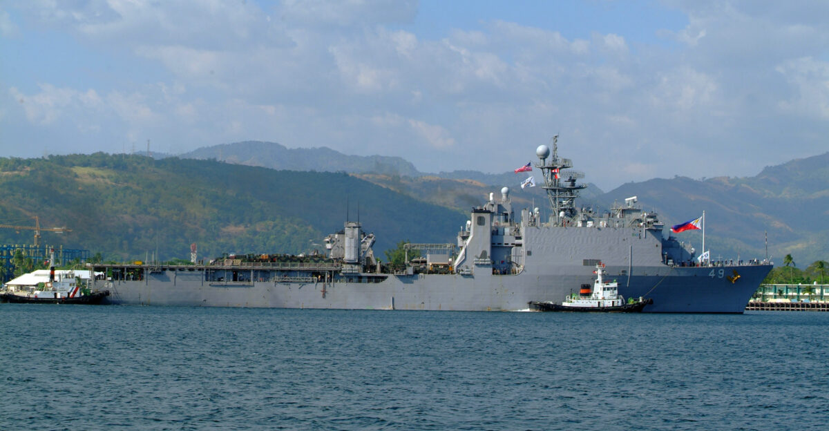 Subic Bay Philippines Feb 17 2006 - The dock landing ship USS Harpers Ferry LSD 49 prepares to moor pier-side Later that same day Harpers Ferry returned to sea along with the amphibious assault ship USS Essex LHD 2 en route to the Philippine Island of Leyte Both ships were ordered into the area to provide much needed humanitarian assistance for the victims of a devastating landslide Both ships are part of the Forward Deployed Amphibious Ready Group ARG the Navy s only forward-deployed amphibious force out of Sasebo Japan U S Navy photo by Journalist 2nd Class Brian P Biller RELEASED