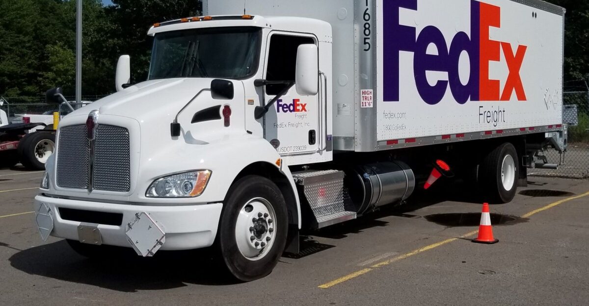 HTS Systems HTS-CC-18 28 Cone Cradle safety cones deployment system equipped on FedEx Freight Kenworth box van delivery truck by Basheer for selling products online