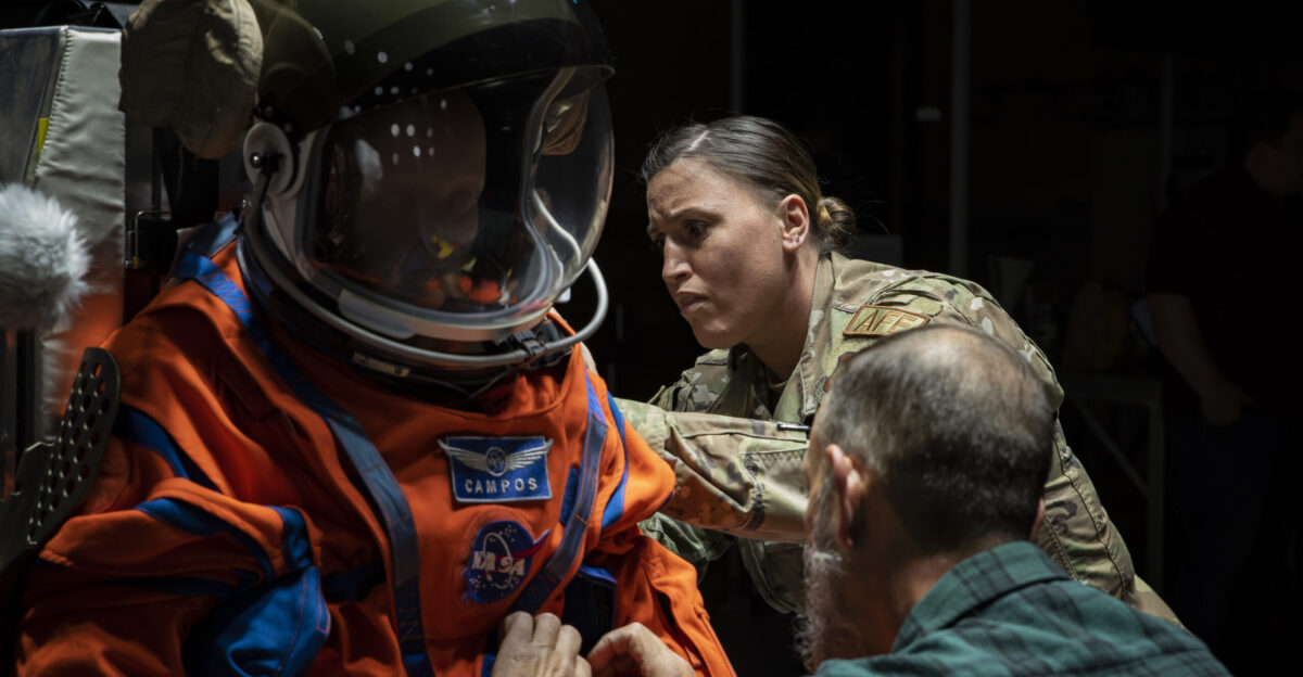The Air Force Research Laboratory or AFRL and NASA staff secure Campos a fire and rescue training manikin into the seat at the sled test facility at Wright-Patterson Air Force Base Ohio April 17 2023 AFRL and NASA along with other industry partners such as Lockheed Martin tested the most current iteration of an astronaut crew seat and flight suit that will be used on the Orion space capsule during the next mission to the moon under the Artemis Program The manikin used in the testing was Campos named after the legendary Arturo Campos an electrical engineer who was instrumental to saving the Apollo 13 crew Campos is accurately weighed and has the appropriate density of a human for testing U S Air Force photo Rick Eldridge