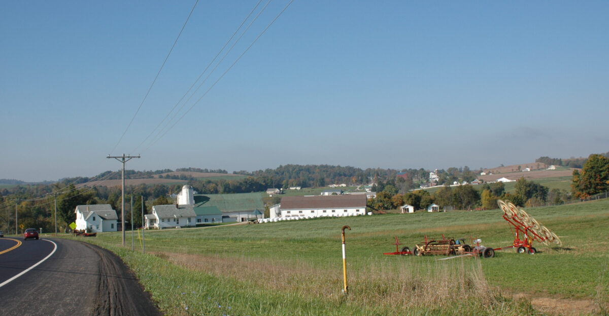 Scope and content The original finding aid described this photograph as Original Caption Farm equipment waits in a field The tidy white buildings of an Amish farm are at the edge of the green field Location Winesburg Ohio 40 618 N 81 691 W Status Public domain Photo by S Clyde