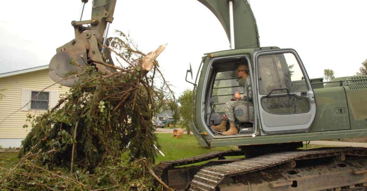 Clearing the damage from a tornado that hit North Dakota on August 26 2007