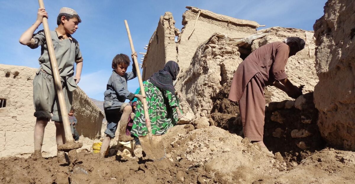 November 2015 - Habibur Rahman right his two sons and his elderly mother rebuild their destroyed home in Afghanistan after the October 2015 earthquake Over 10 000 homes have been damaged or destroyed in the disaster UNICEF Afghanistan and UNICEF Pakistan are working with their governments to deliver life-saving supplies to children and families UNICEF AFGA2015-00005 Ashna by UNICEF