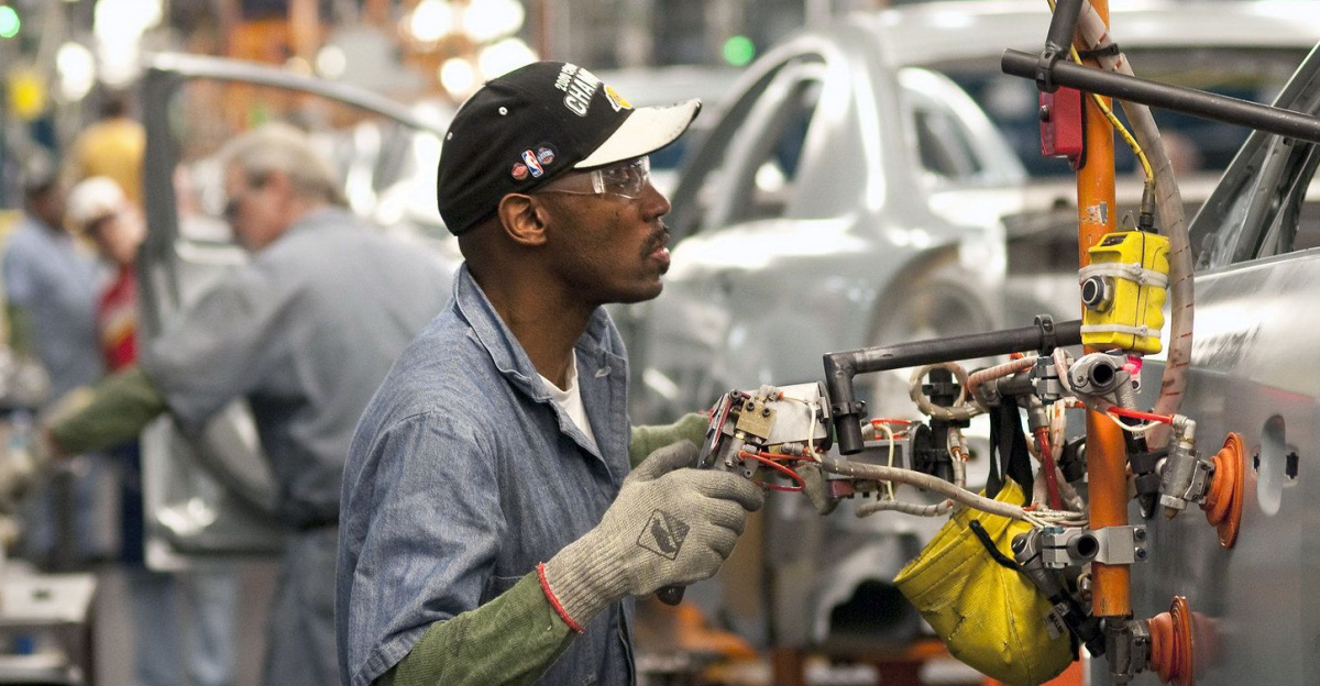 Interesting gloves and goggles - the gloves could be different for different jobs, allowing dexterity for minute functions - Detroit 2010 by Jennifer Brawn Gittings