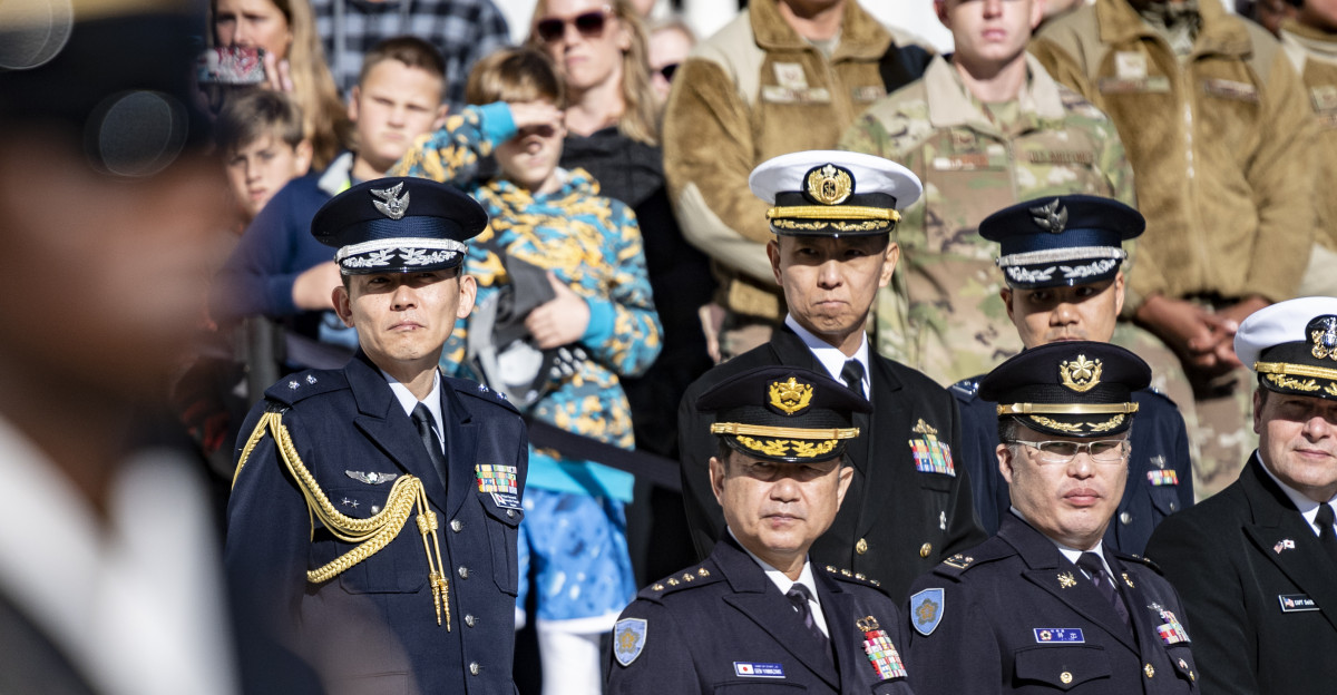 Gen K ji Yamazaki chief of staff Joint Staff of the Japan Self-Defense Forces and others view the Changing of the Guard at the Tomb of the Unknown Soldier at Arlington National Cemetery Arlington Va Oct 19 2022 U S Army photo by Elizabeth Fraser Arlington National Cemetery released