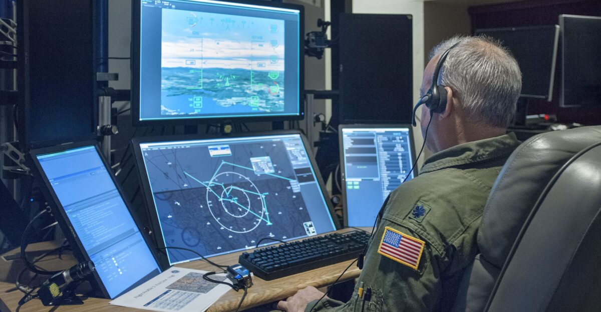 A test pilot operates a virtual large unmanned aircraft system or UAS with simulated air traffic at a NASA research ground control station during tests of a detect-and-avoid technology Credits NASA Ames by Michael Moody
