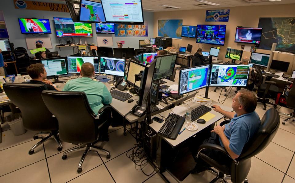 Forecasters at the National Weather Service office monitor Hurricane Irma Saturday Sept 9 2017 at the hurricane center in Miami AP Photo Andy Newman by Morgan Sheridan