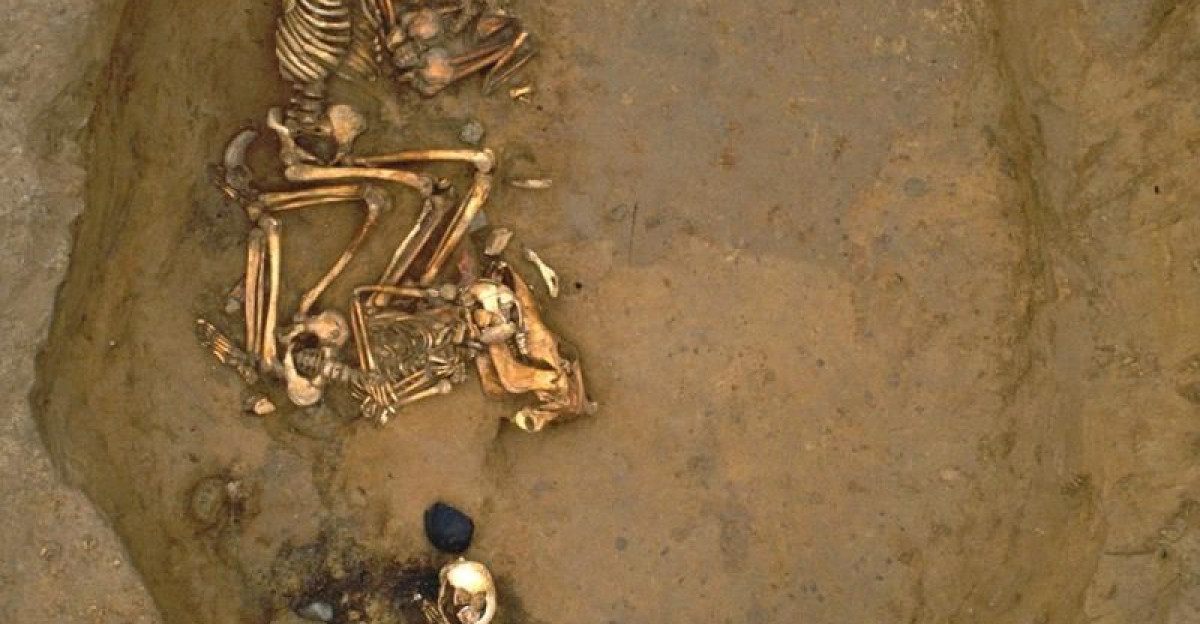 Human remains in a pit by Daniel Griffin