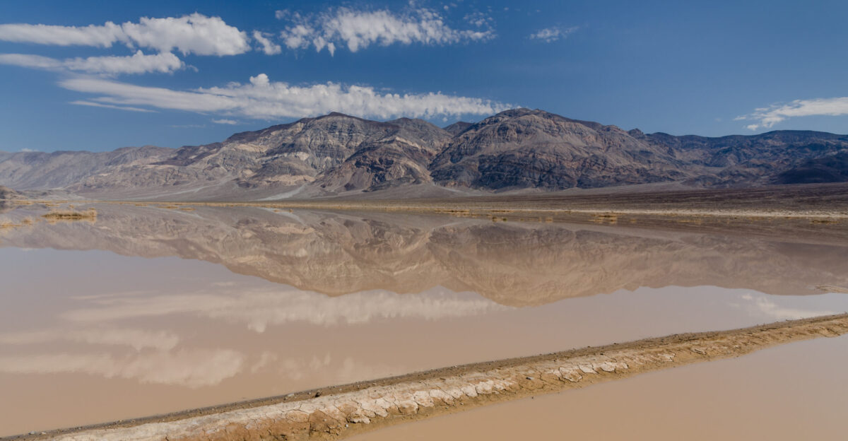 View on Panamint Butt Panamint Valley from SR190 at the end of Death Valley with flash floods and reflections in the water