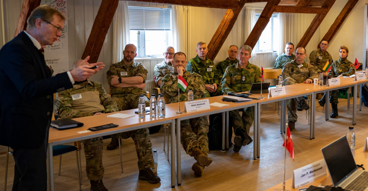 Michael Zilmer-Johns, Institute for Strategy and War Studies Royal Danish Defence College senior mentor, gives a briefing on security defense in Europe and Scandinavia during the European Chief Leadership Symposium at the Kastellet in Copenhagen, Denmark, March 20, 2024. The symposium was attended by 29 senior noncommissioned officers from 22 different nations including the U.S. (U.S. Air Force photo by Tech. Sgt. Steven Adkins)