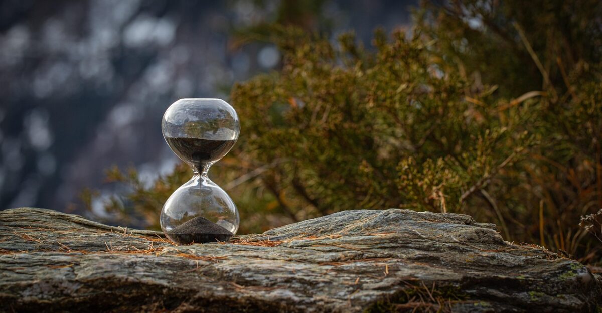 hourglass time rock stone transience countdown hour sand