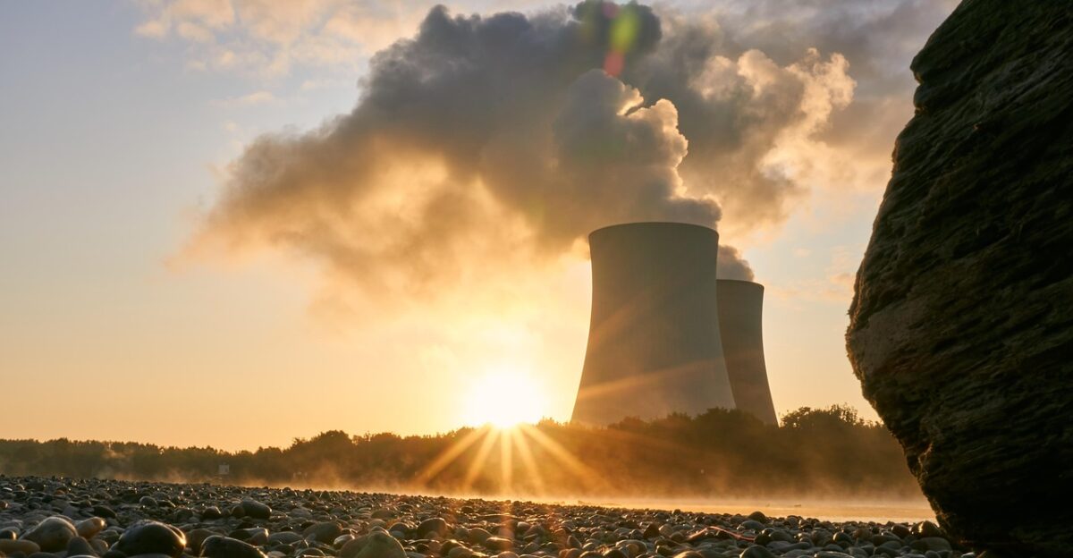 nuclear power plant cooling tower sunrise mood rhine nature flow low water nuclear power atomic energy smoke steam heaven industry energy technology power supply electricity nuclear reactor nuclear dawn dazzling star backlighting