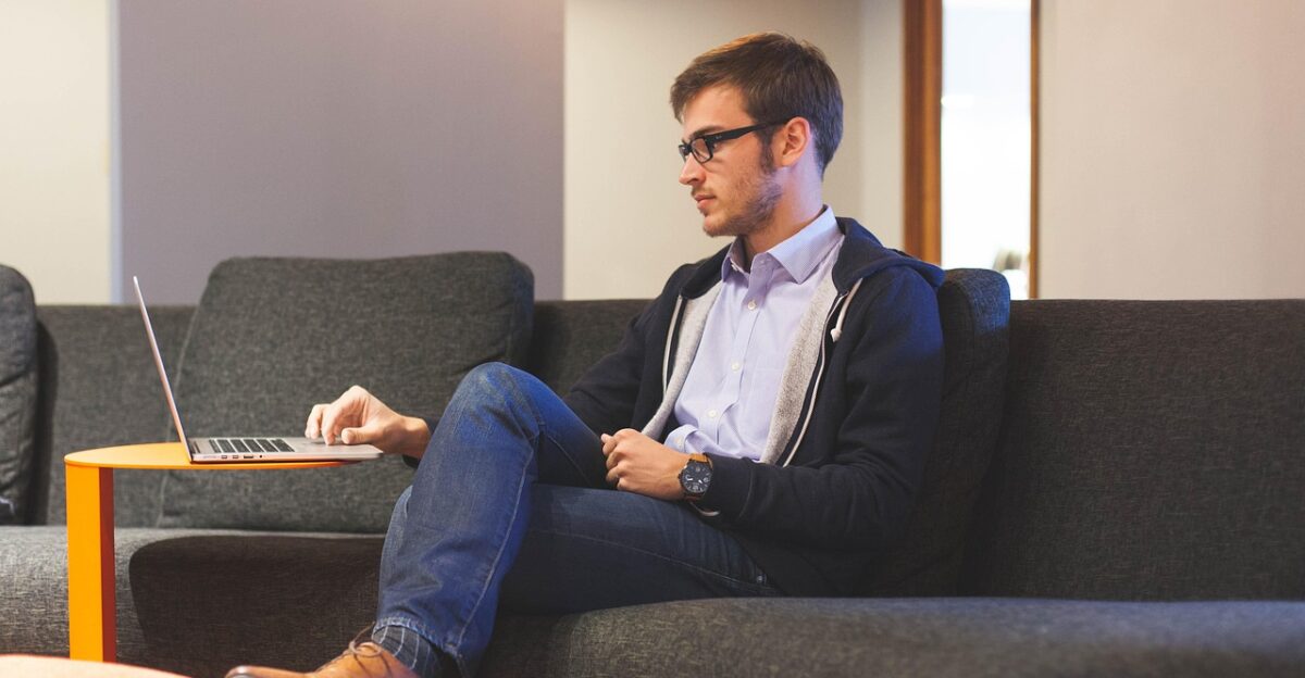 entrepreneur start-up man planning business office businessman young corporate working company freelance freelancer notepad notebook sitting couch casual man man man man man business business office