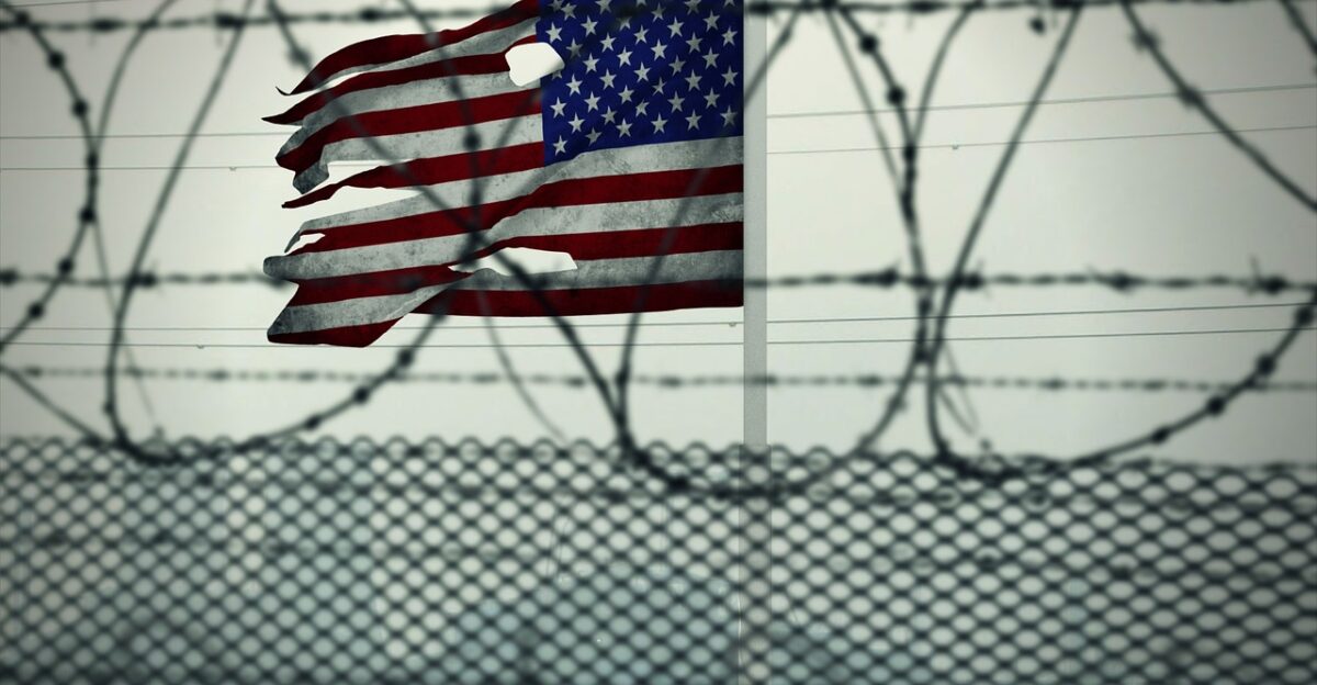american flag usa barded wire guantanamo bay detention camp jail lockup penitentiary prison military naval base gray prison gray camping american flag jail prison prison prison prison prison
