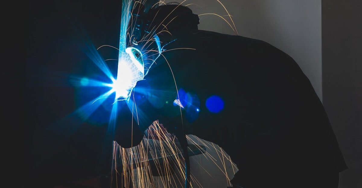 welding sparks engineering working welder industry worker metal factory production work man mask steel industrial employee workshop equipment