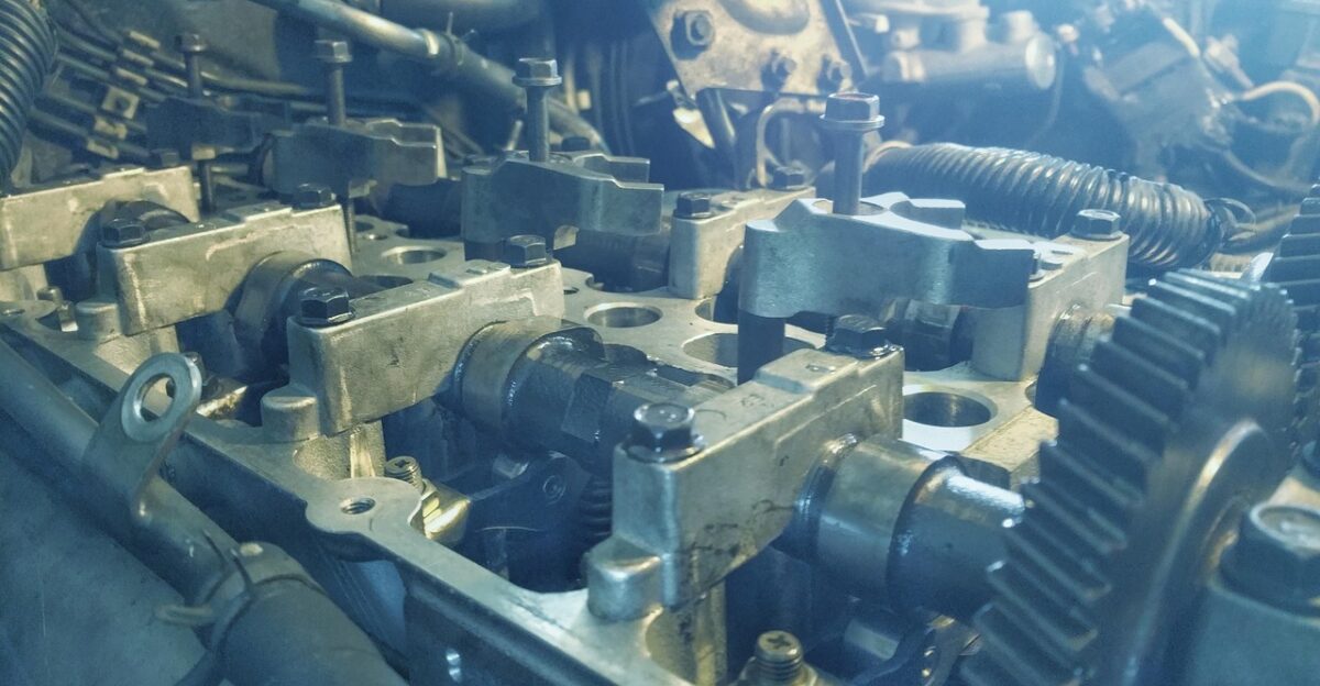 engine motor automotive vehicle mechanic machine technology auto automobile transportation repair industry mechanical oil gear power transport industrial garage fuel machinery metallic blue car blue garage blue metal blue power blue industry mechanic mechanic mechanic garage garage garage garage garage machinery