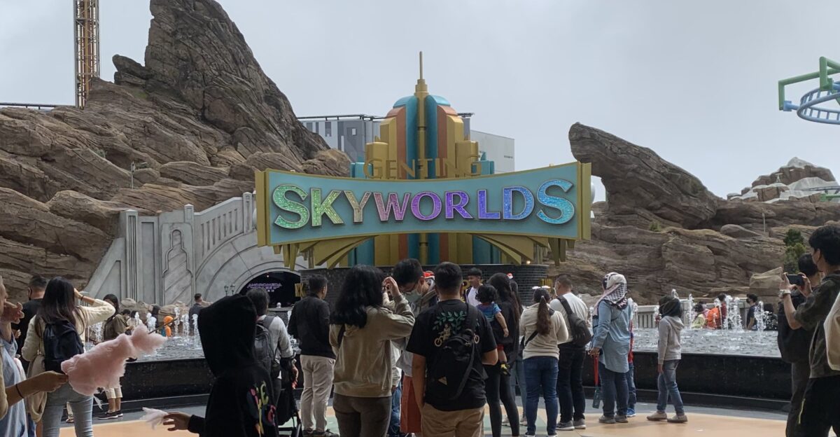 The main entrance for Genting Skyworlds Theme Park filled with visitors