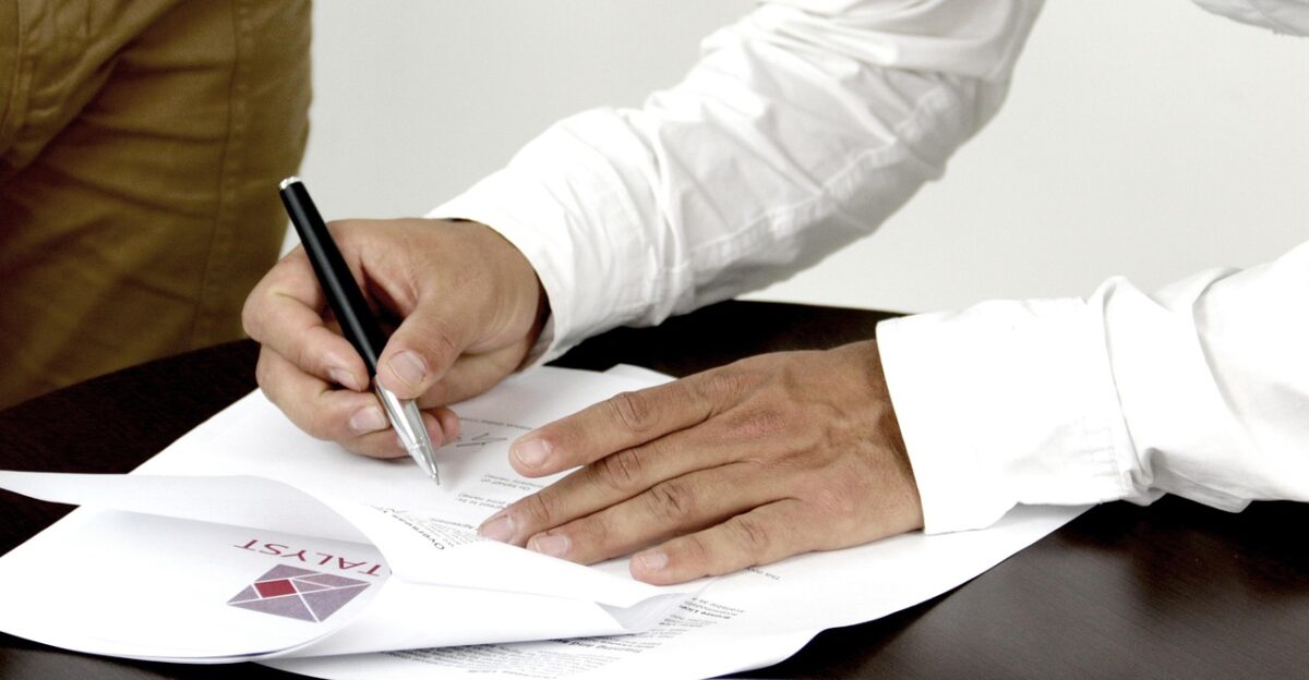 firm contract person signing a document firm contract contract contract contract contract