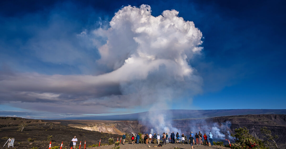 Visitors watch the summit eruption of K lauea volcano from the Keanak ko i side of the caldera on June 6 2023 NPS Photo Janice Wei