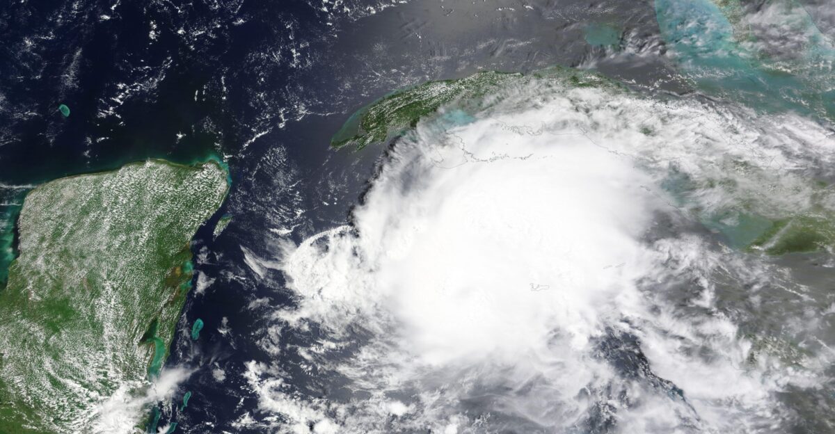 Hurricane Beryl was barreling towards a landfall on Mexico s Yucatan Peninsula when the Moderate Resolution Imaging Spectroradiometer MODIS on NASA s Aqua satellite acquired this true-color image on July 4 2024 Near the time the image was acquired Beryl carried maximum sustained winds of about 100 miles per hour 175 km h according to the National Hurricane Center NHC That windspeed placed it at the very top end of a Category 2 storm on the Saffir-Simpson Hurricane Wind Scale It was located about 215 miles 345 km east-southeast of Tulum Mexico and about 200 miles 325 km west of Grand Cayman and was moving west-northwest at 20 miles per hour 31 km h Hurricane Beryl made landfall just northeast of Tulum Mexico at 6 05 am EST 1105 UTC on July 5 as a Category 2 storm with windspeeds still at 100 mph 175 km h It quickly lost strength over land as it battered the northern Yucatan peninsula and emerged over the Gulf of Mexico as a tropical storm that same evening carrying maximum sustained winds of about 60 miles per hour 96 5 km h Early damage reports from Mexico include downed trees flooding and widespread power outages Some reports indicate that the well-built resorts in the region as well as the popular tourist beaches have weathered the storm well but many structures less strongly built have suffered damage to roofs and walls Beryl has accumulated a list of superlatives It was the first hurricane of the 2024 Atlantic season as well as the earliest-forming Category 5 hurricane on record in the region It was also the strongest storm ever recorded to pass through the Grenadines and the easternmost hurricane to ever form in June Beryl killed at least five people when it smashed across Carriacou Petit Martinique Grenada St Vincent and other Caribbean Islands as a monster Category 5 storm It also reportedly killed three people in Venezuela although it did not make landfall in that country Two deaths have been reported in Jamaica which was side swiped as the storm passed off the southern coast The Cayman Islands were also strongly impacted by Beryl s strong winds as it passed at Category 3 strength Despite the long swath of destruction Beryl may not be finished Although emerging over the Gulf of Mexico as a tropical storm it is forecast to pass over the warm waters of the Gulf over the next several days With sea surface temperatures of about 80 F 27 C conditions are favorable for intensification Current models predict that it is likely to make landfall on the Texas coast as a Category 1 or 2 hurricane sometime on July 7