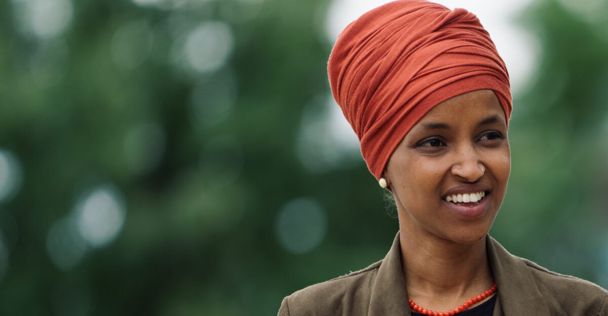 Congresswoman Ilhan Omar listens to community members endorsing her at a press conference outside the Minnesota DFL Party s St Paul Minn headquarters on August 5 2020 in the final days before the primary election in Minnesota s 5th Congressional District