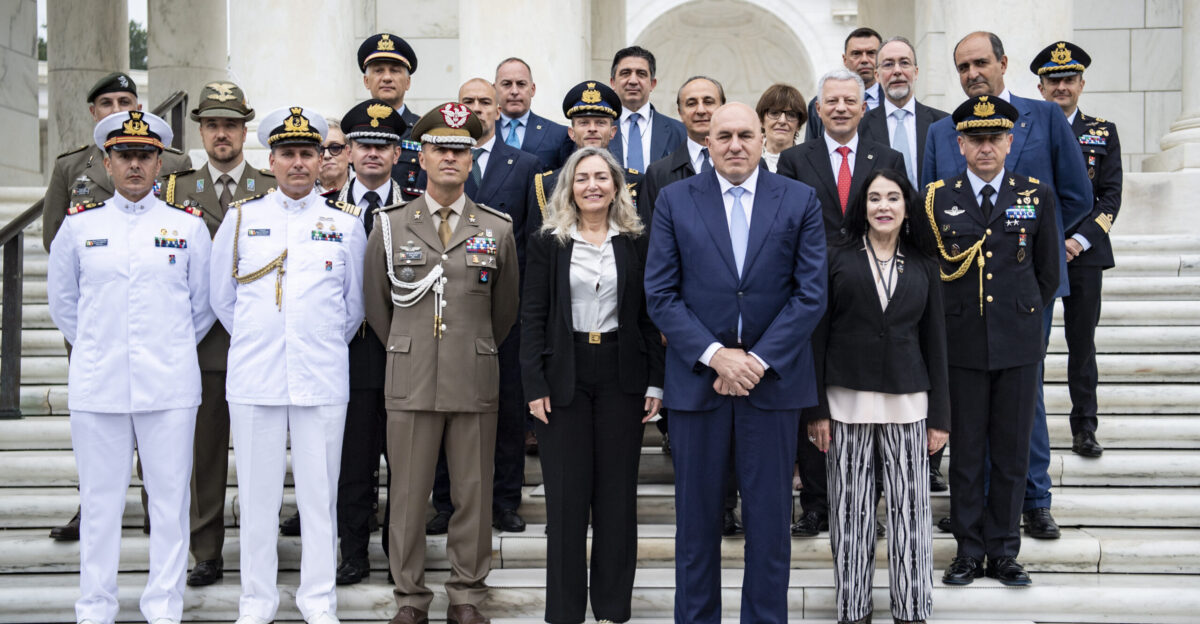 Italian Minister of Defense Guido Crosetto Italian Ambassador to the U S Mariangela Zappia Office of Army Cemeteries and Army National Military Cemeteries Executive Director Karen Durham-Aguilera and others pose for a photo on the west steps of the Memorial Amphitheater at Arlington National Cemetery Arlington Va June 23 2023 U S Army photo by Elizabeth Fraser Arlington National Cemetery released
