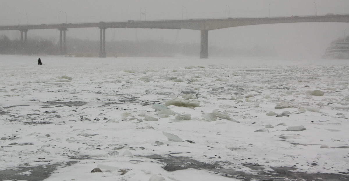 Loneliness solitude in snow storm River ice Frozen Don River Winter in Russia Rostov-on-Don Russia