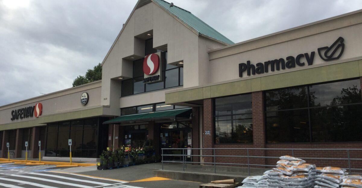 With all the trees in the parking lot this is about the only way I could get all the signage in one picture Safeway has apparently gotten the Albertsons trait of selling landscaping supplies during the summer - they traditionally sold some plants but I don t remember them selling bags of mulch and soil like Albertsons always did
