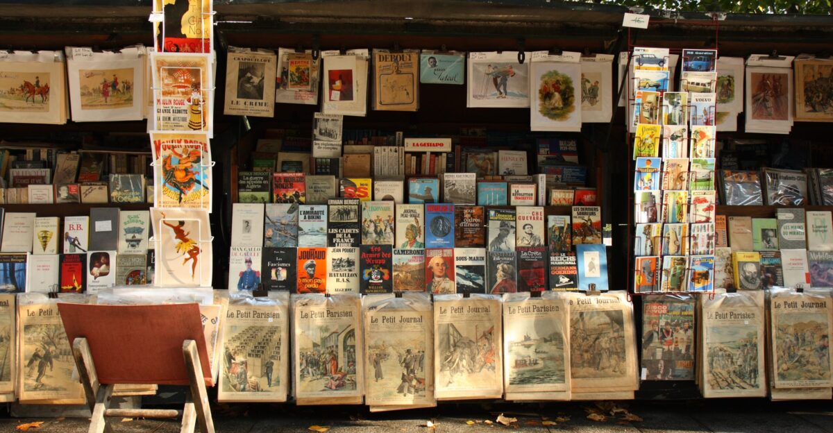 A stand of a bouquiniste French term for second-hand books resellers in Paris near the Cathedral Notre-Dame of Paris Bouquinistes can be considered a landmark of Paris There are nearly 250 of them mainly located in the central area of the city alongside the banks of the Seine river