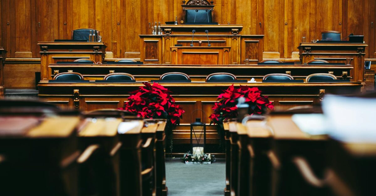Spacious and elegant wooden courtroom with empty seats located in Bern Switzerland