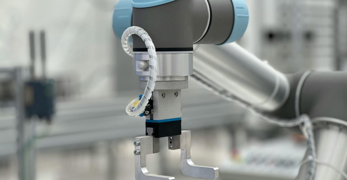 Close-up of a robotic arm in a modern industrial environment highlighting technology