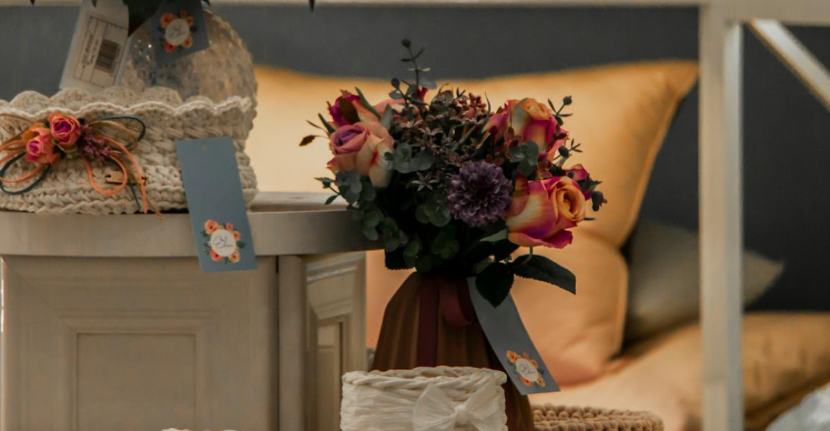 A cozy indoor setting featuring wicker baskets adorned with colorful floral arrangements