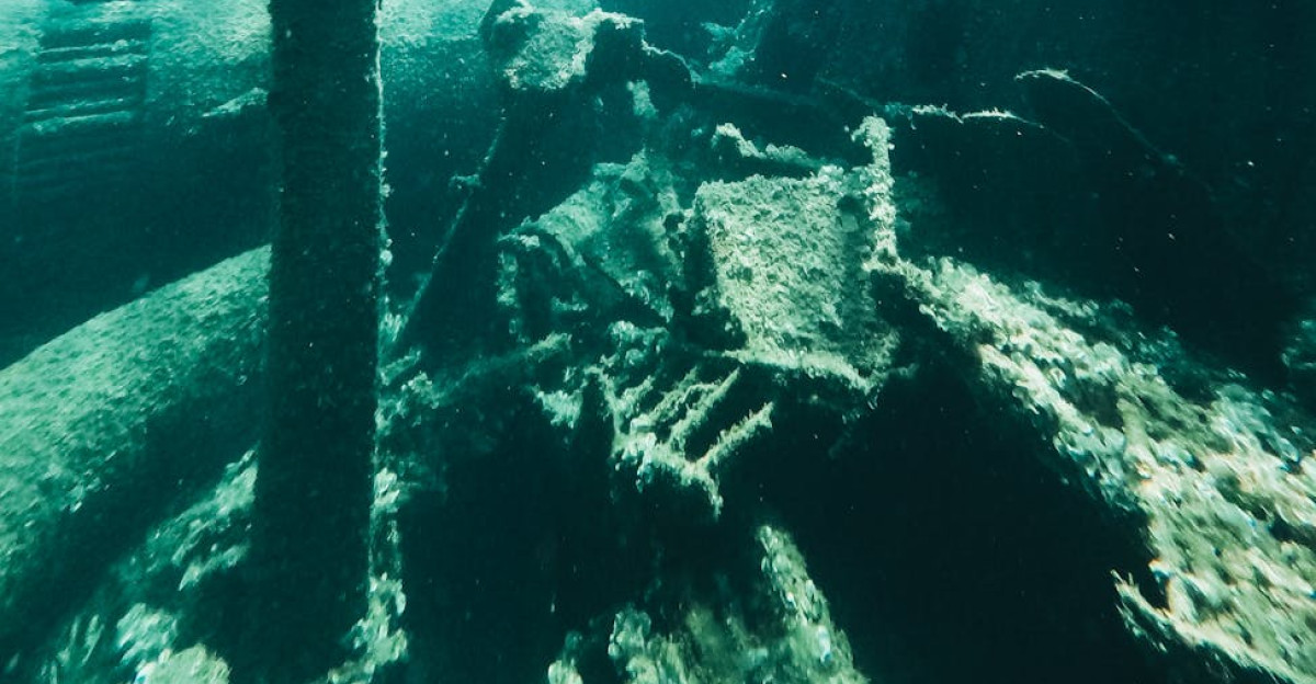 Explore the mystery of an underwater shipwreck in the ocean s depths