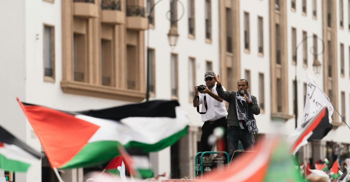 Large protest in Rabat with Palestinian flags and speakers highlighting solidarity