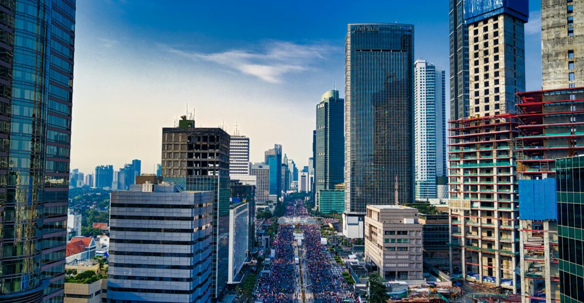 Stunning aerial view of Jakarta s modern skyline with bustling streets below