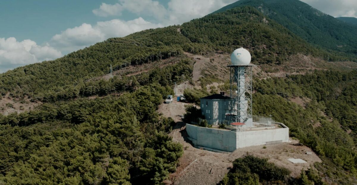 Weather station nestled in the lush mountains of Hatay T rkiye under a clear sky