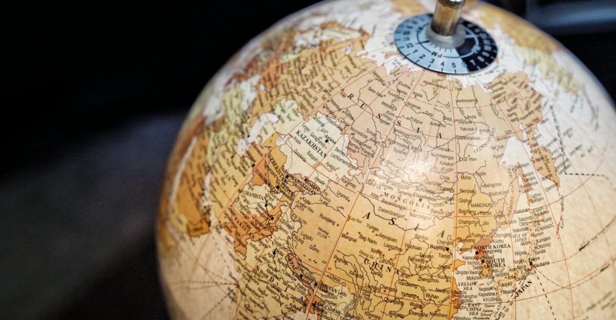 Close-up of a vintage style globe with a focus on Asia and surrounding regions