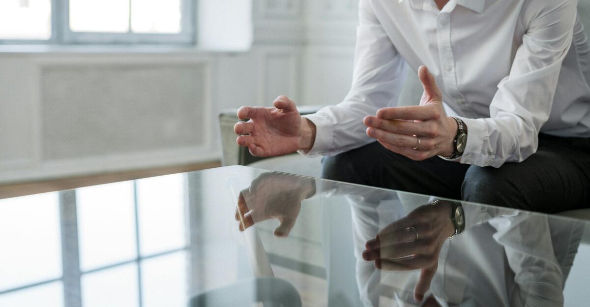 Professional consultant discussing solutions during a meeting indoors