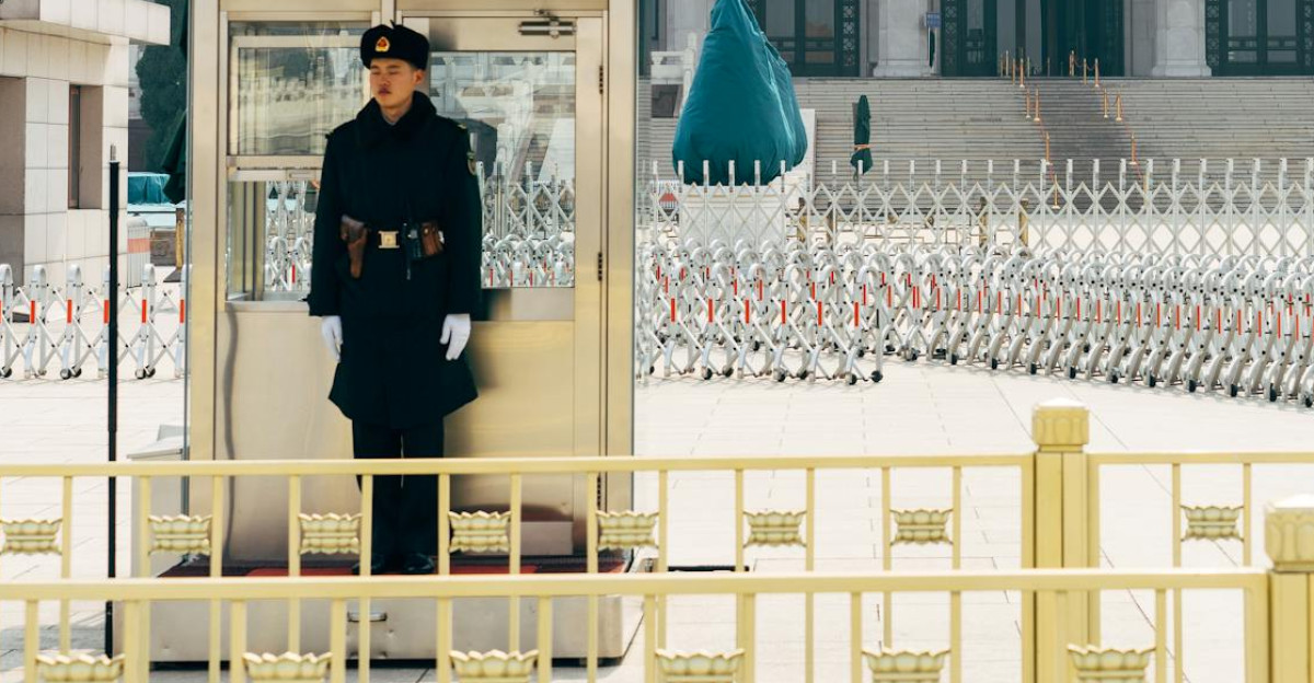 A soldier stands in guard post outside Chairman Mao Memorial Hall in Beijing China